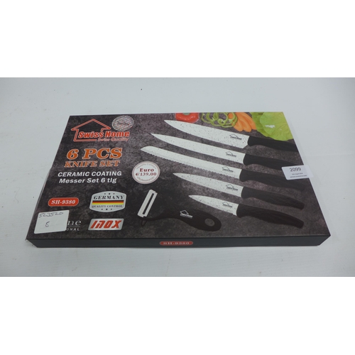 2099 - A Swiss Home 6 piece ceramic coated knife set