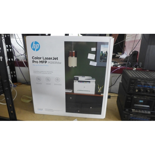 2116 - A HP Colour Laserjet printer Pro MFP M283FDW, unused