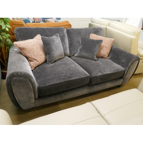 1376 - An ink blue velvet three seater sofa with contrasting scatter cushions, brand new