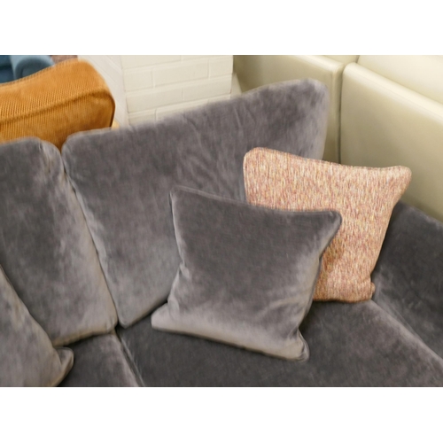 1376 - An ink blue velvet three seater sofa with contrasting scatter cushions, brand new