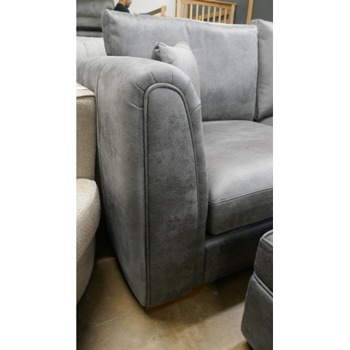 1393 - A charcoal Alcantara corner sofa and footstool, brand new, very slight colour variation to cushion c... 