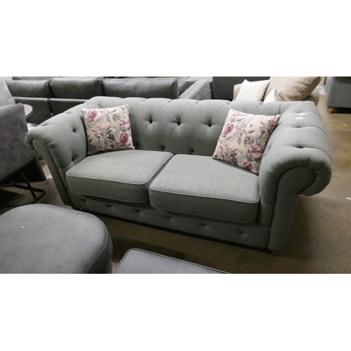 1395 - A grey weave upholstered Chesterfield three seater sofa, brand new RRP £1379