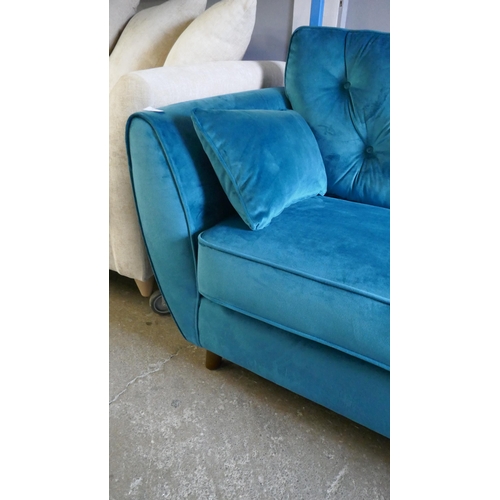 1400 - A turquoise velvet Hoxton three seater sofa and footstool, brand new RRP £1018