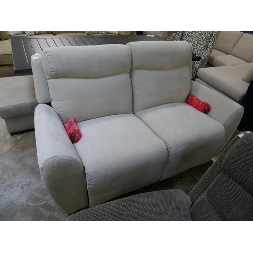 1423 - An ivory textured velvet electric reclining two seater sofa, brand new