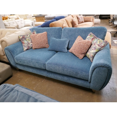 1427 - A kingfisher blue textured velvet three seater sofa with contrasting scatter cushions, brand new