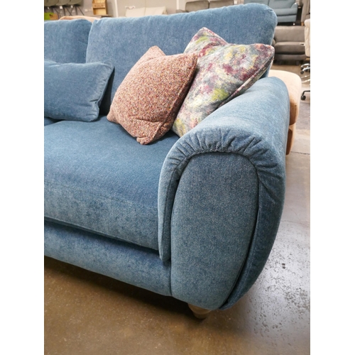 1427 - A kingfisher blue textured velvet three seater sofa with contrasting scatter cushions, brand new