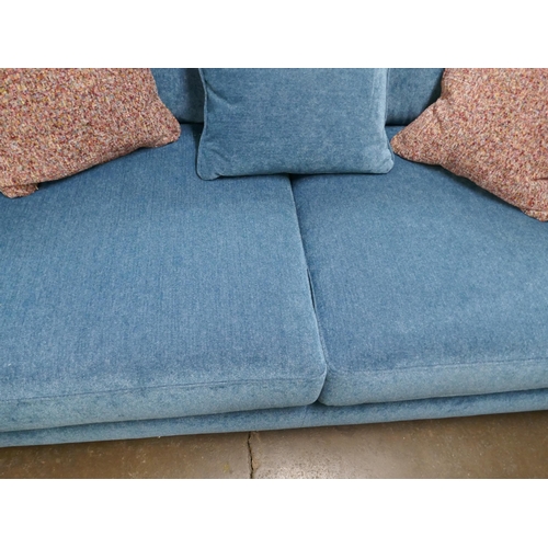 1427 - A kingfisher blue textured velvet three seater sofa with contrasting scatter cushions, brand new