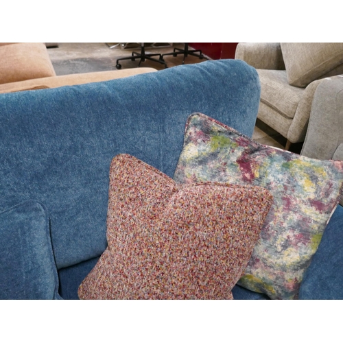 1427 - A kingfisher blue textured velvet three seater sofa with contrasting scatter cushions, brand new