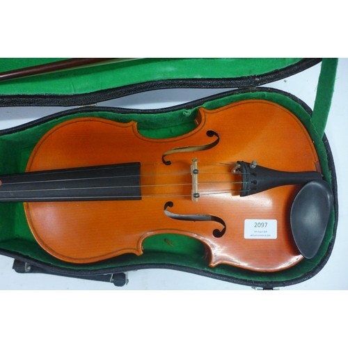 2097 - A practice violin and bow in case