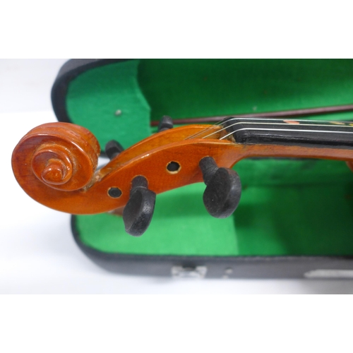 2097 - A practice violin and bow in case