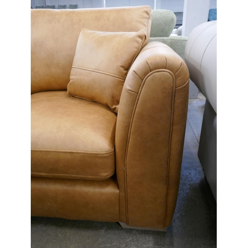 1452 - A tan Alcantara three seater sofa, brand new RRP £749