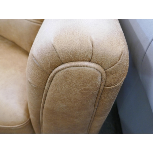 1452 - A tan Alcantara three seater sofa, brand new RRP £749