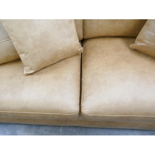 1452 - A tan Alcantara three seater sofa, brand new RRP £749