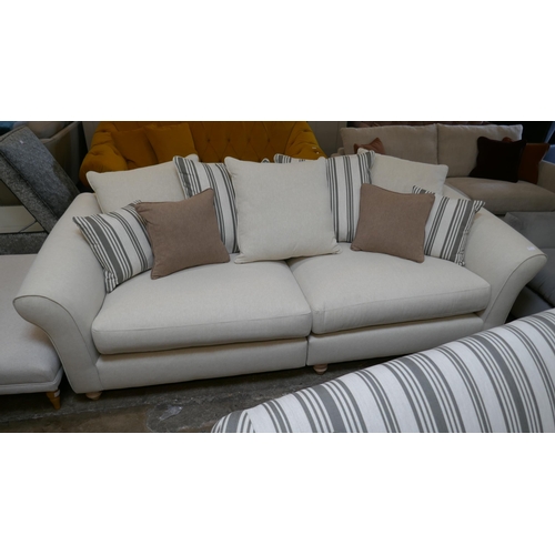 1463 - A calico three seater sofa with contrasting scatter cushions and a calico and olive three seater sof... 