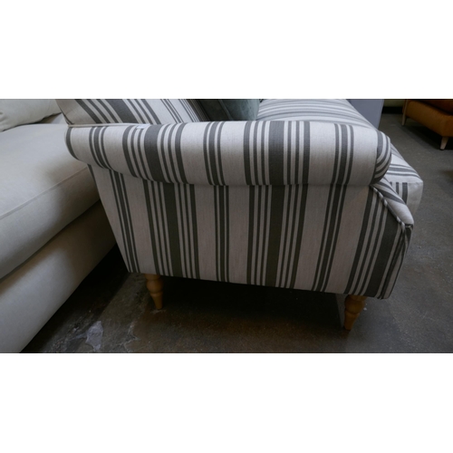 1463 - A calico three seater sofa with contrasting scatter cushions and a calico and olive three seater sof... 