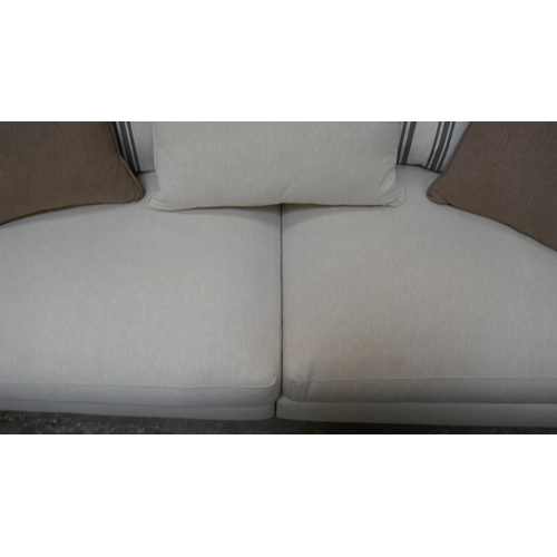 1463 - A calico three seater sofa with contrasting scatter cushions and a calico and olive three seater sof... 