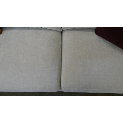 1487 - A grey velvet three seater sofa, brand new RRP £1019