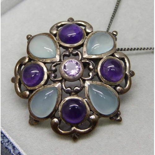 1003 - A silver, moonstone and amethyst pendant and chain