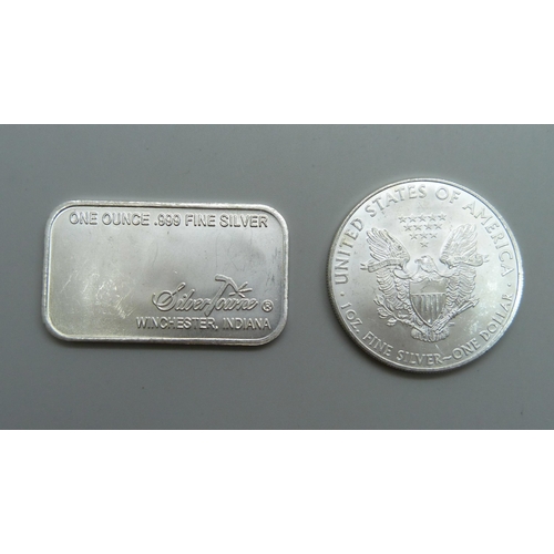 1008 - A 2009 United States 1oz. fine silver one-dollar coin and a one ounce fine silver ingot