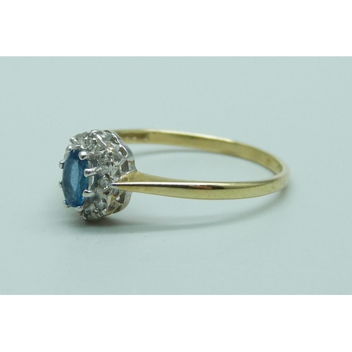 1013 - A 9ct gold blue stone and diamond cluster ring, 1.5g, S