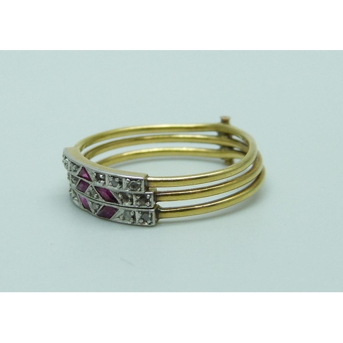 1015 - A triple yellow metal Art Deco ruby and diamond ring, 2.8g, O, lacking a diamond