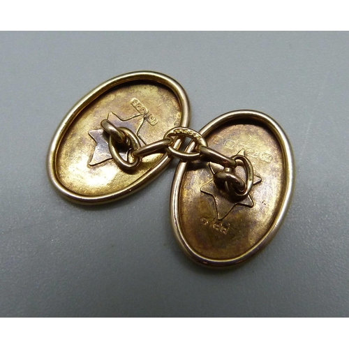 1024 - A pair of 15ct gold cufflinks, 3.8g