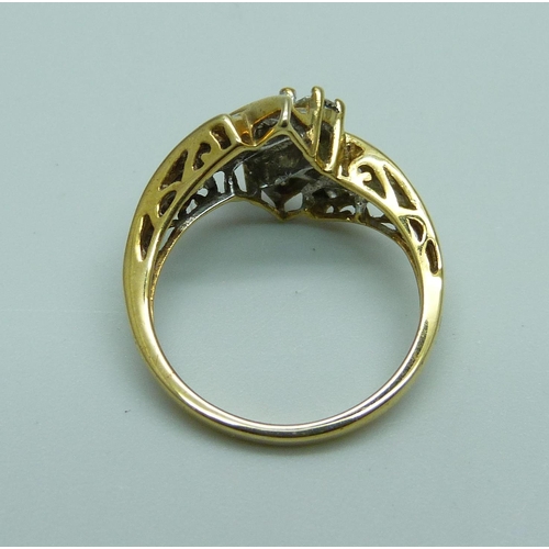 1029 - A 10k gold and diamond cocktail ring, 3.1g, N