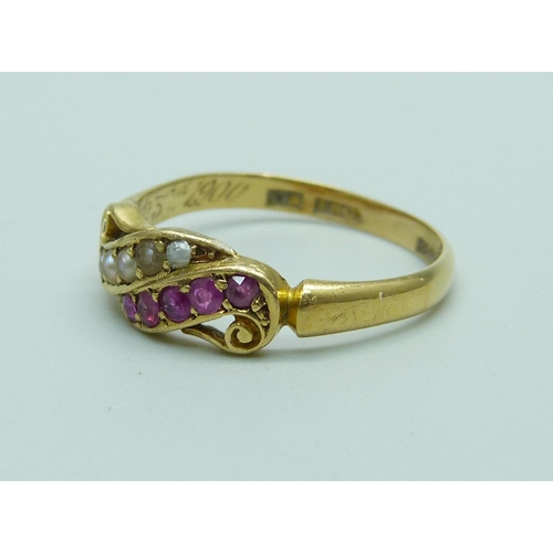 1030 - An 18ct gold ruby and pearl ring, with inscription dated 1900, 3.2g, Q, in a vintage box