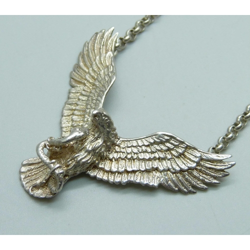 1036 - A silver eagle with snake necklace, 23g, 47.5cm