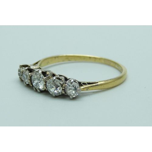 1037 - An 18ct gold five stone diamond ring, approximately 0.70ct weight, 2.1g, P