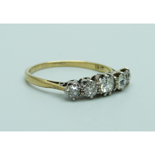 1037 - An 18ct gold five stone diamond ring, approximately 0.70ct weight, 2.1g, P