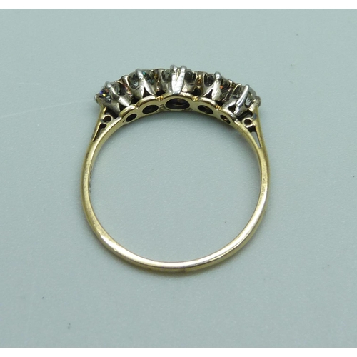 1037 - An 18ct gold five stone diamond ring, approximately 0.70ct weight, 2.1g, P