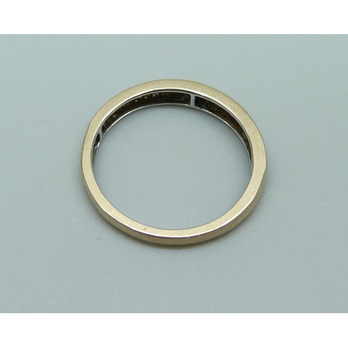 1058 - A yellow metal and diamond ring, 1.7g, L