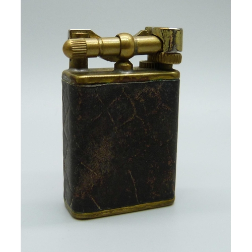 1069 - A vintage Mulberry Casanova lighter with leather overlay, with logo impression