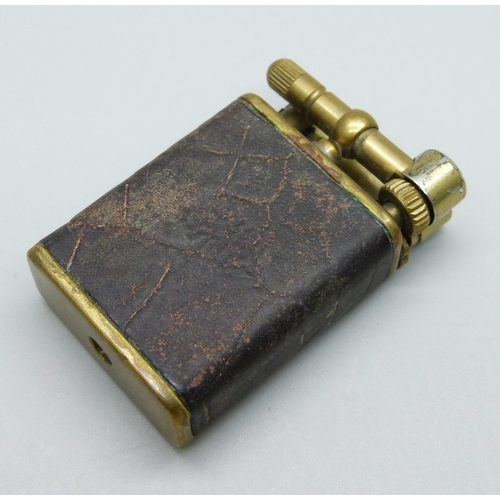 1069 - A vintage Mulberry Casanova lighter with leather overlay, with logo impression