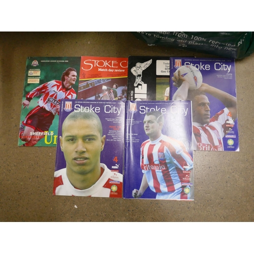 1085 - Over 150 Stoke City home and away football programmes, some autographed