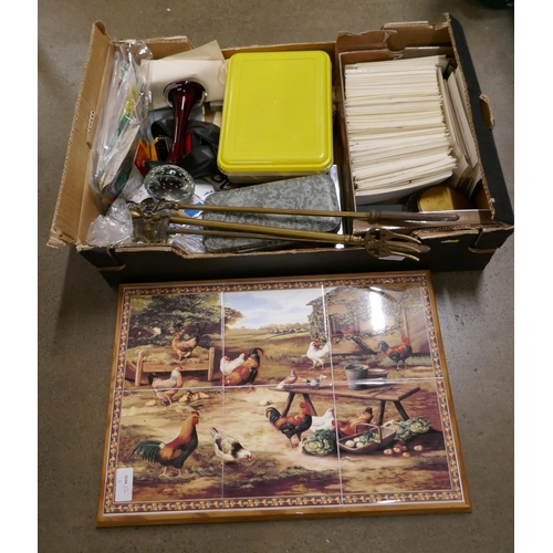 1086 - A box of assorted items, set of six framed tiles, postcards, brass, glass vase, etc. **PLEASE NOTE T... 