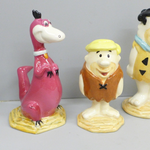 606 - Six Beswick Fred Flintstone figures, five boxed