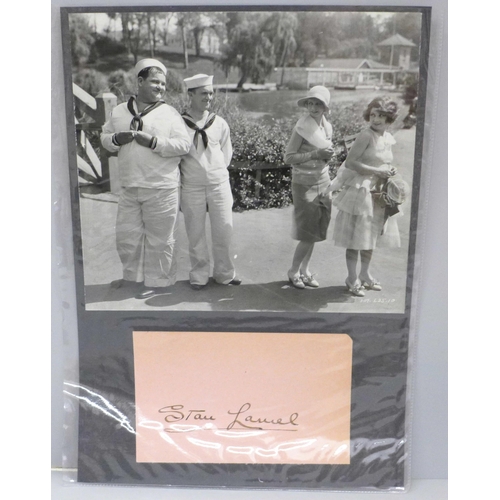 607 - A Stan Laurel autograph with an original 1940's Laurel and Hardy black and white photograph, with CO... 