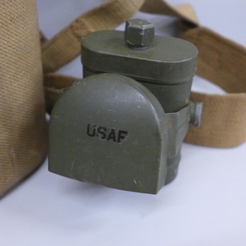 610 - A military issue water bottle, marked 1942 and a USAF lamp