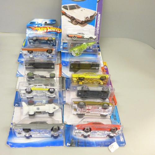 625 - Fourteen Hot Wheels model vehicles, in bubble packs