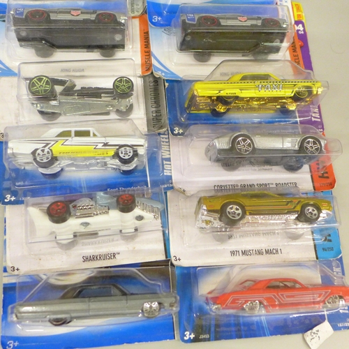 625 - Fourteen Hot Wheels model vehicles, in bubble packs