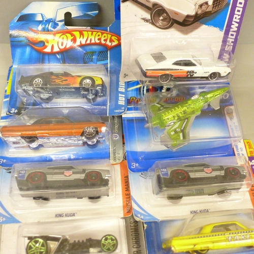 625 - Fourteen Hot Wheels model vehicles, in bubble packs