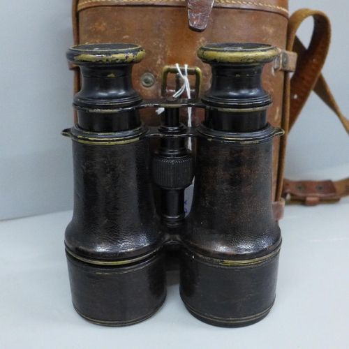 629 - A French pair of Lumiere Paris binoculars, cased and a pair of 6x30 binoculars