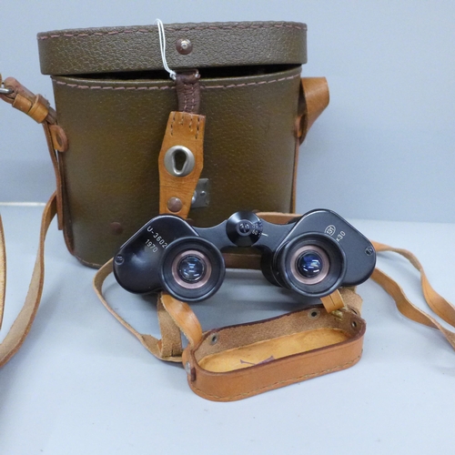 632 - A pair of binoculars, stamped U-36021 1970 131, 6x30, cased