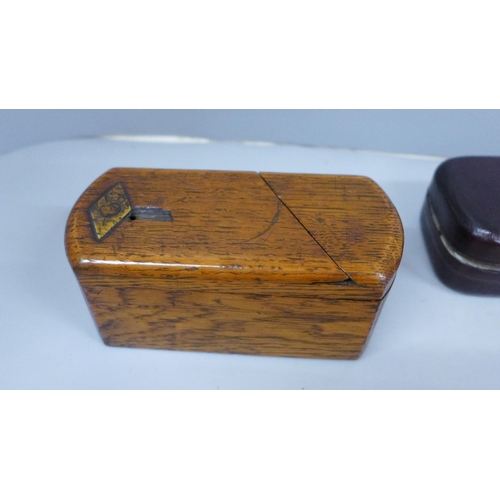 634 - Two cased travel inkwells and a wooden puzzle box