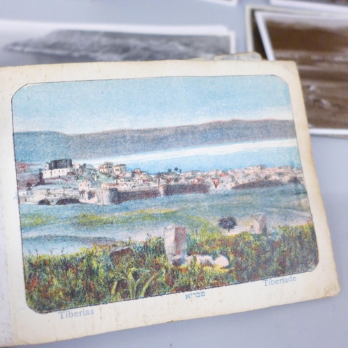 638 - A collection of approximately 60 postcards including ships, seaside, Stonehenge, etc., and a souveni... 