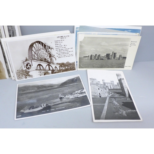 638 - A collection of approximately 60 postcards including ships, seaside, Stonehenge, etc., and a souveni... 