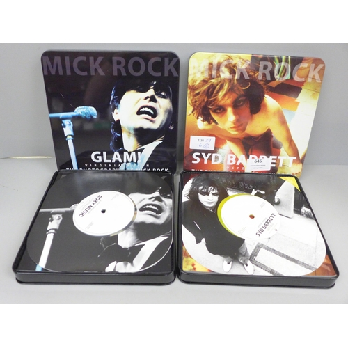 645 - Two Mick Rock photography collectable tins with singles - Glam! Virginia plain on clear vinyl and Sy... 