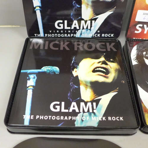 645 - Two Mick Rock photography collectable tins with singles - Glam! Virginia plain on clear vinyl and Sy... 